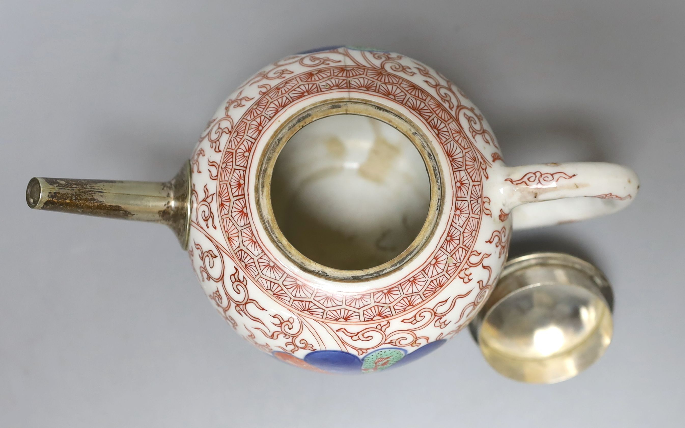 A Chinese Kangxi white metal-mounted porcelain teapot 19cm long